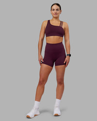 Woman wearing Galvanise Sports Bra 2.0 - Cherry Lacquer | Model:Keisha | Size:S