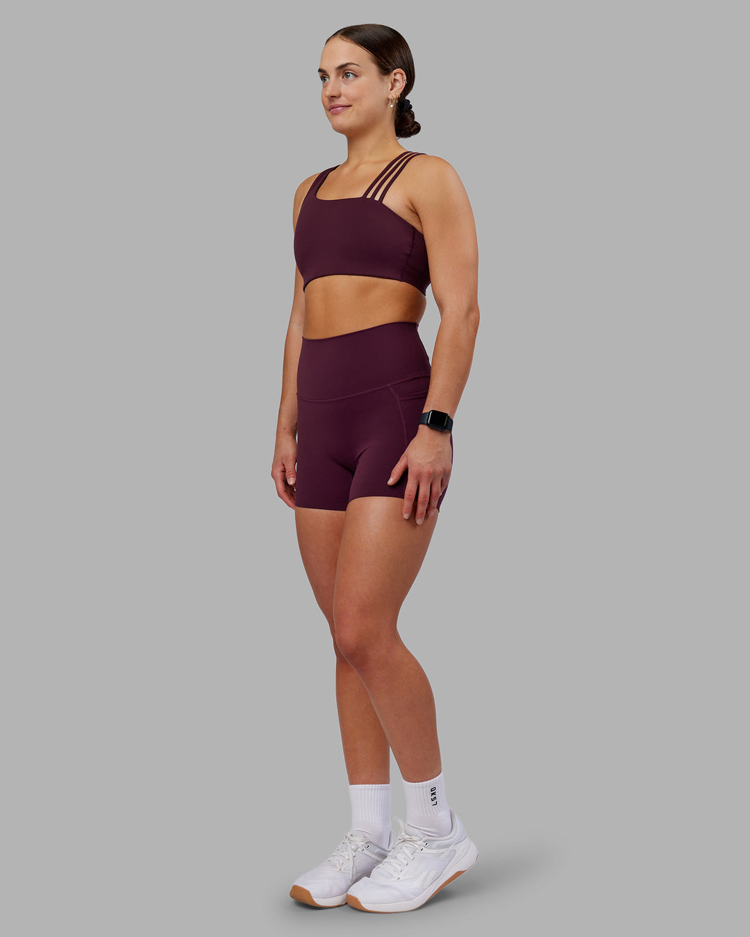 Woman wearing Galvanise Sports Bra 2.0 - Cherry Lacquer | Model:Keisha | Size:S