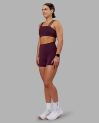 Woman wearing Galvanise Sports Bra 2.0 - Cherry Lacquer | Model:Keisha | Size:S