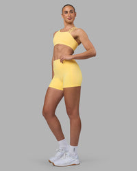Woman wearing Galvanise Sports Bra 2.0 - Lemon | Model:Sophie | Size:S