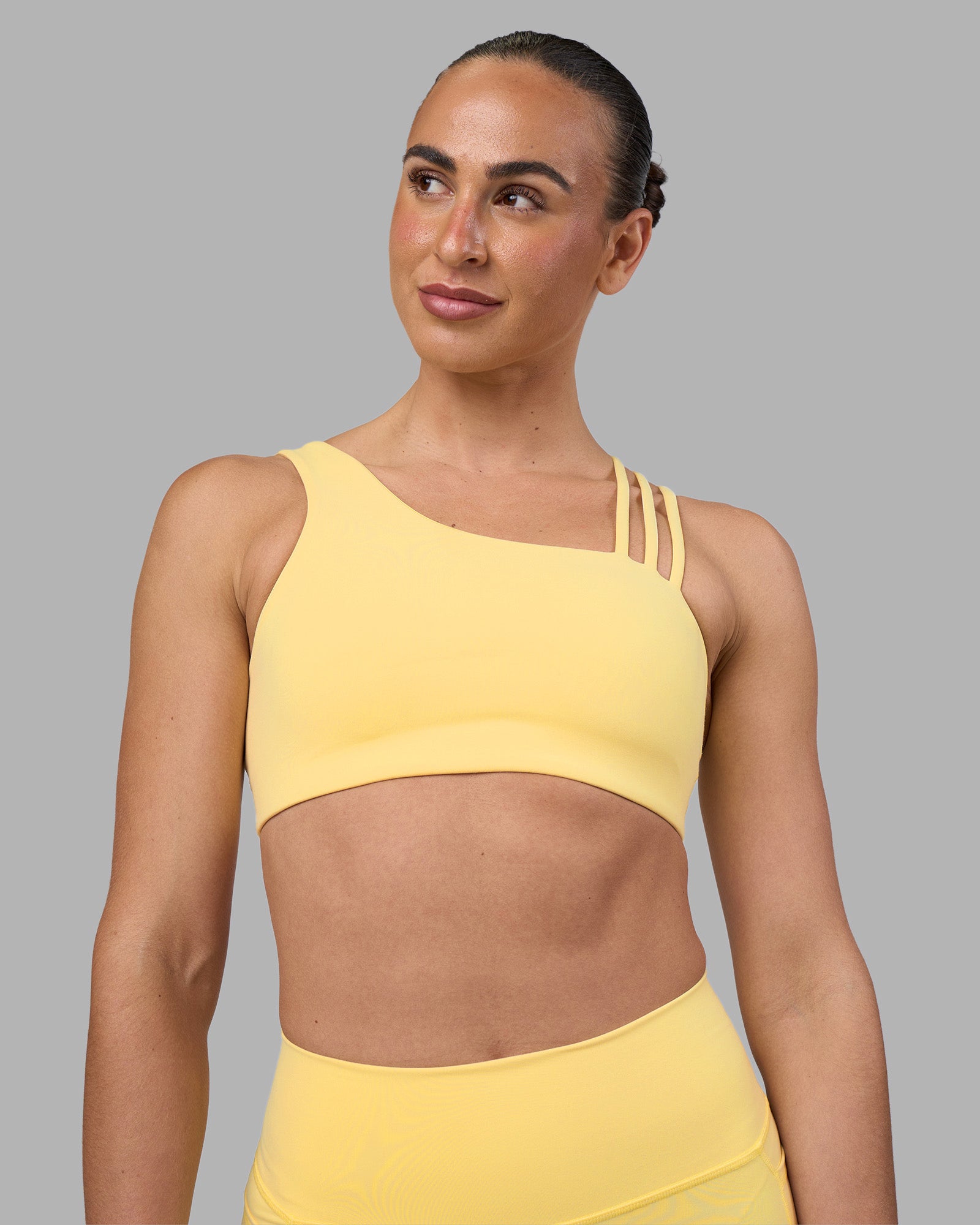 Woman wearing Galvanise Sports Bra 2.0 - Lemon | Model:Sophie | Size:S