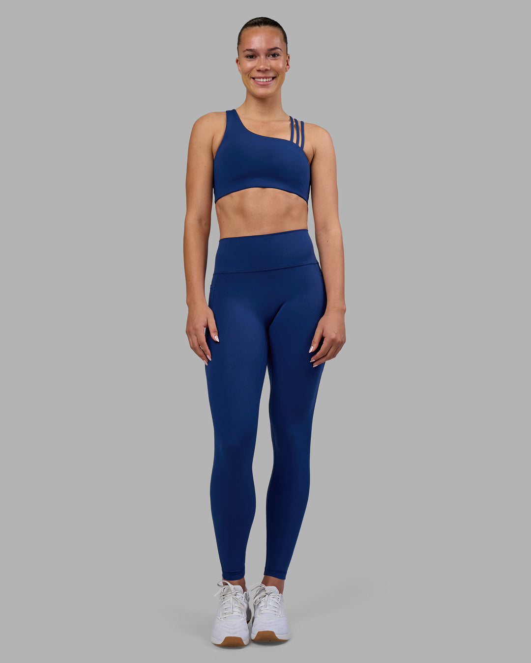 Woman wearing Galvanise Sports Bra 2.0 - Midnight Blue | Model:Charlize | Size:S