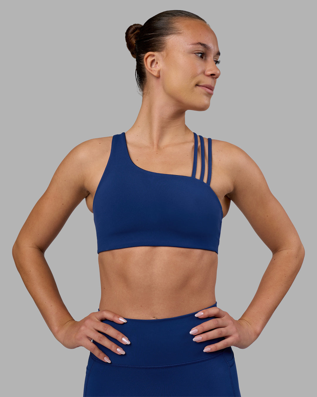 Woman wearing Galvanise Sports Bra 2.0 - Midnight Blue | Model:Charlize | Size:S
