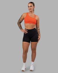 Woman wearing Galvanise Sports Bra 2.0 - Ultra Orange | Model:Robyn | Size:S