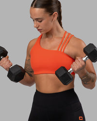 Woman wearing Galvanise Sports Bra 2.0 - Ultra Orange | Model:Robyn | Size:S