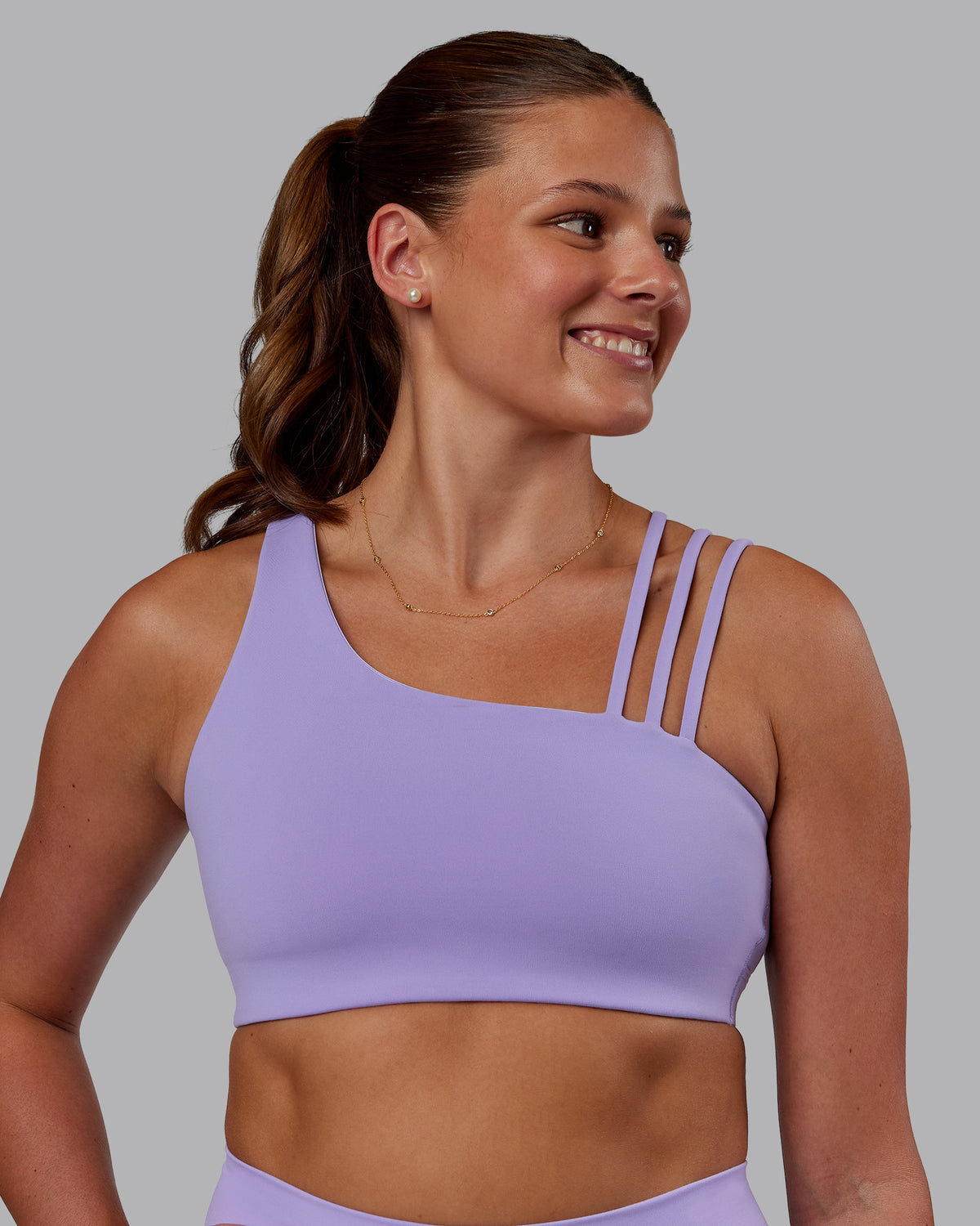 Woman wearing Galvanise Sports Bra 2.0 - Violet Ray | Model:Phoebe | Size:S