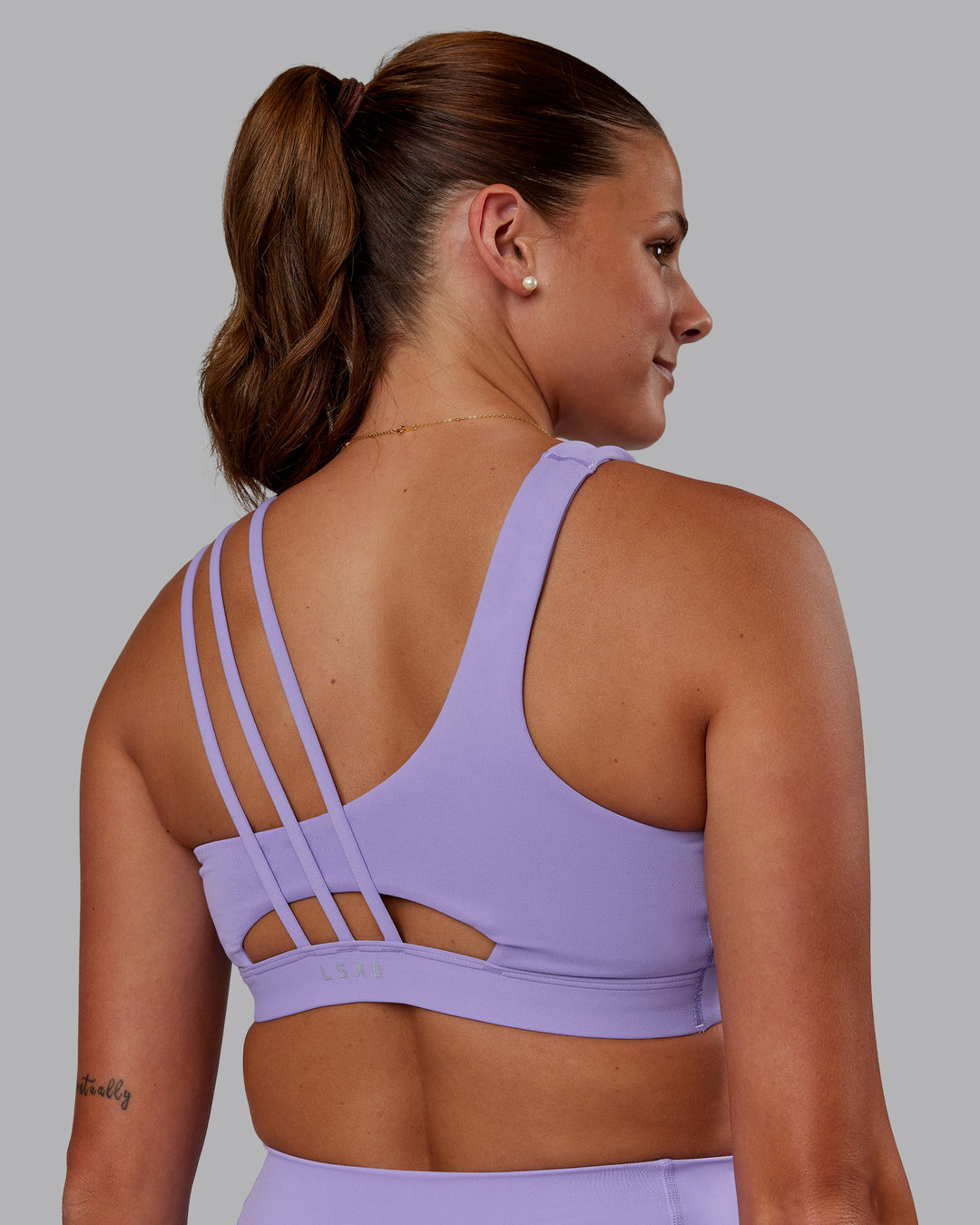 Woman wearing Galvanise Sports Bra 2.0 - Violet Ray | Model:Phoebe | Size:S