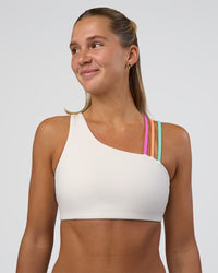 Woman wearing Galvanise Sports Bra 2.0 - Off White-Multi | Set:true | Angle:front | Model:Amity | Size:S