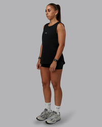 Woman wearing Go-To FLXCotton Longline Tank - Black-White | Size:S | Model:Tylah