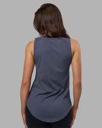 Woman wearing Go-To FLXCotton Longline Tank - Night Shadow-White | Model:Phoebe | Size:S