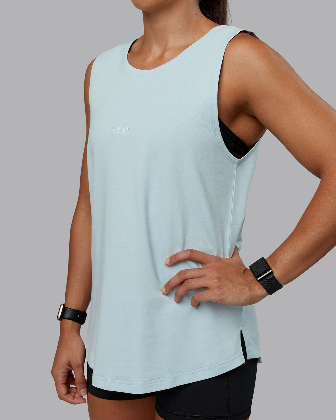 Woman wearing Go-To FLXCotton Longline Tank - Skyride-White | Size:S | Model:Tylah
