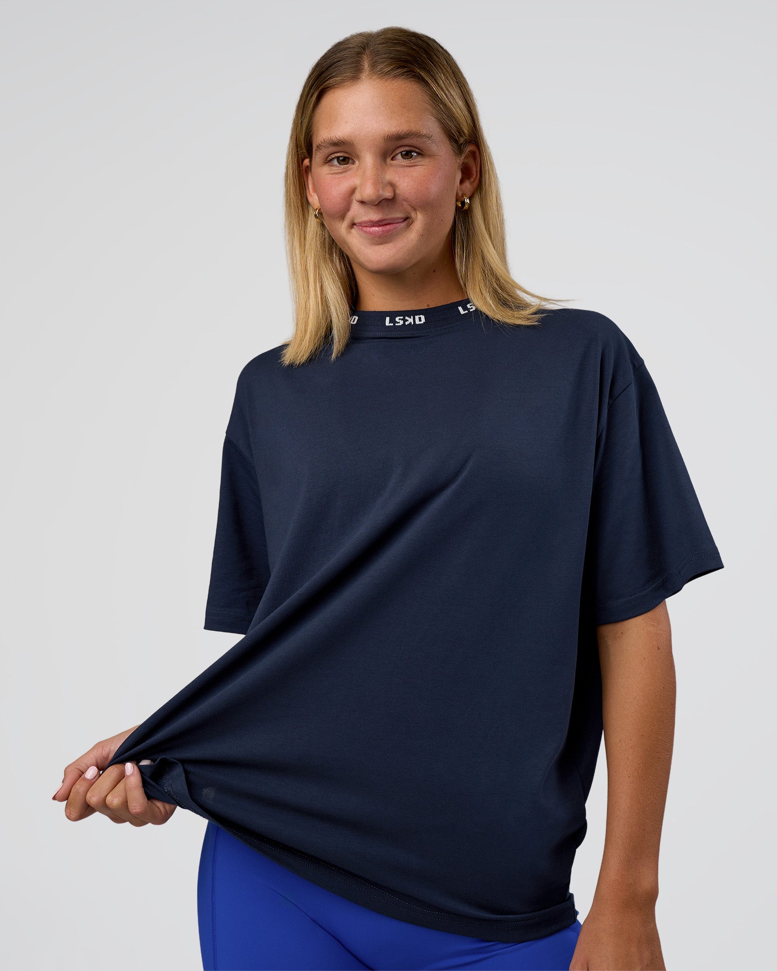 Woman wearing Go-To FLXCotton Oversized Deviation Tee - Future Navy-White | Model:Amity | Size:S
