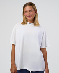 Woman wearing Go-To FLXCotton Oversized Deviation Tee - White-Future Navy | Model:Amity | Size:S