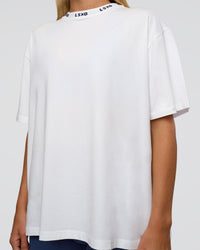 Woman wearing Go-To FLXCotton Oversized Deviation Tee - White-Future Navy | Model:Amity | Size:S