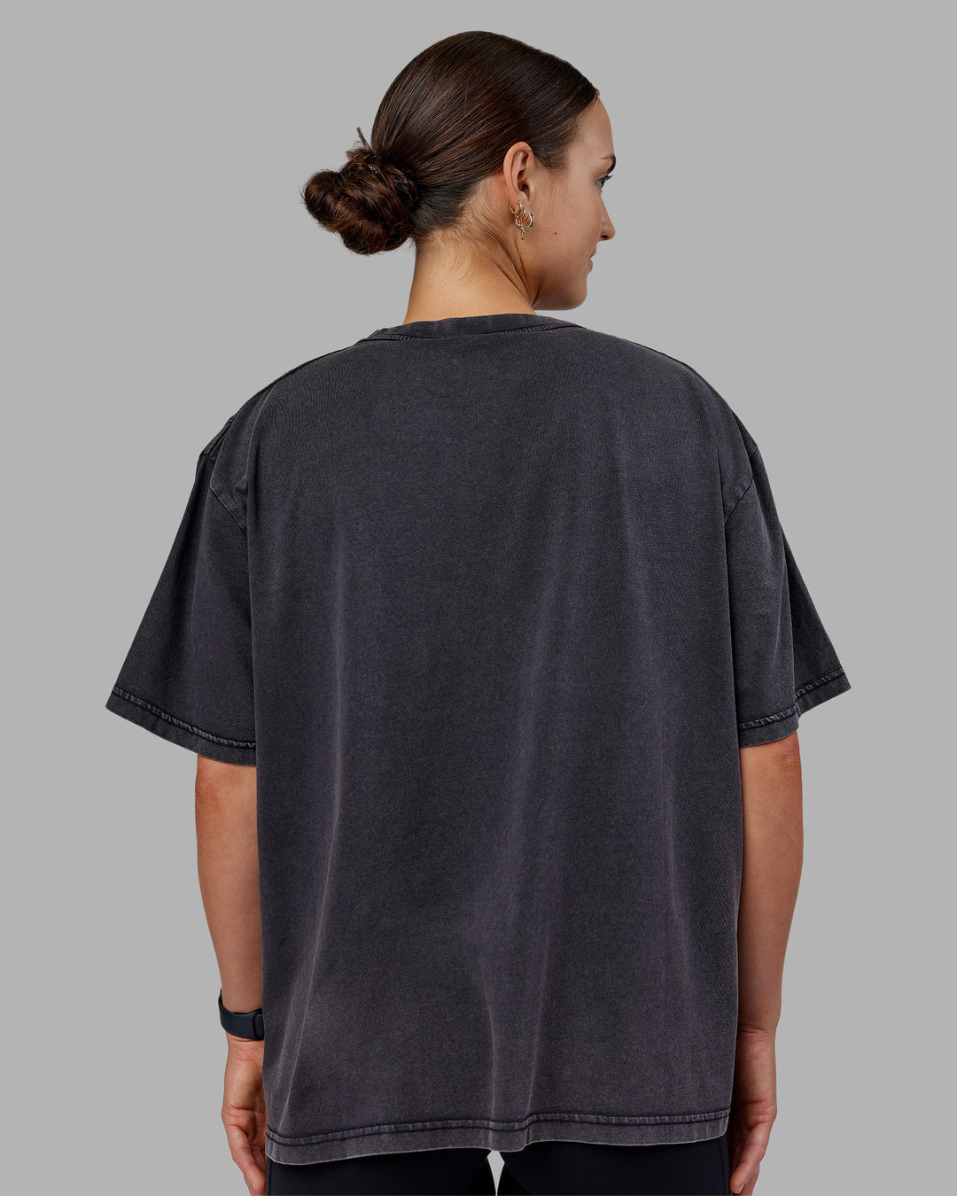 Woman wearing Go-To FLXCotton Oversized Tee - Black Washed-White | Model:Keisha | Size:S