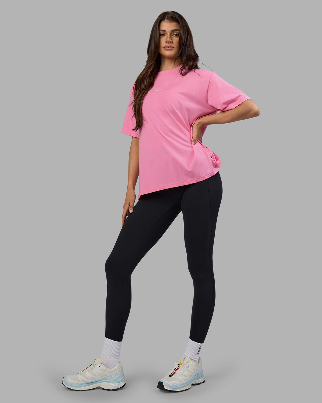 Woman wearing Go-To FLXCotton Oversized Tee - Candy Pink-White | Model:Phoebe | Size:S