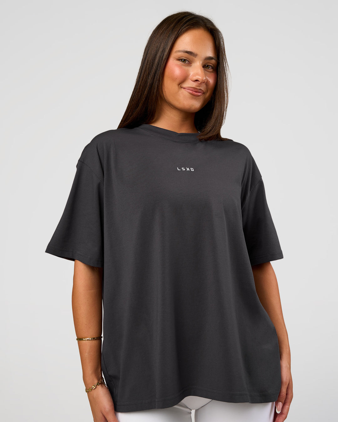 Woman wearing Go-To FLXCotton Oversized Tee - Dark Storm-White | Model:Bianca | Size:S