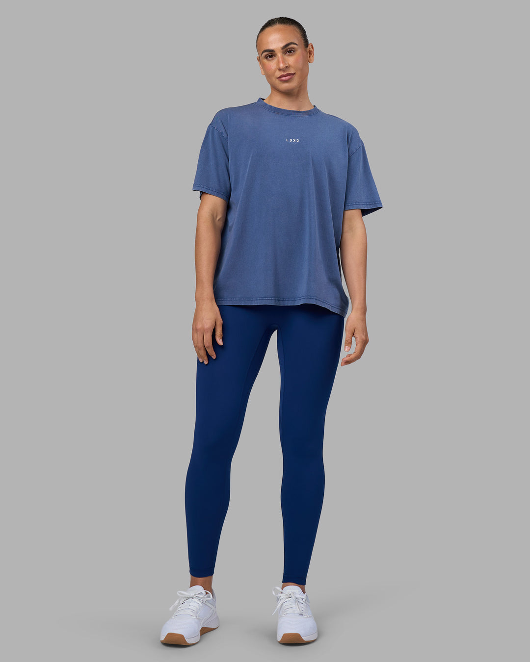 Woman wearing Go-To FLXCotton Oversized Tee - Midnight Blue Washed-White | Model:Sophie | Size:S