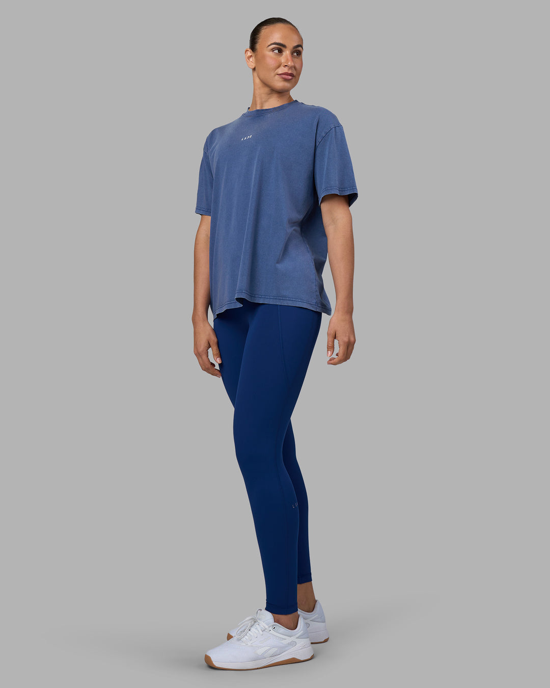 Woman wearing Go-To FLXCotton Oversized Tee - Midnight Blue Washed-White | Model:Sophie | Size:S