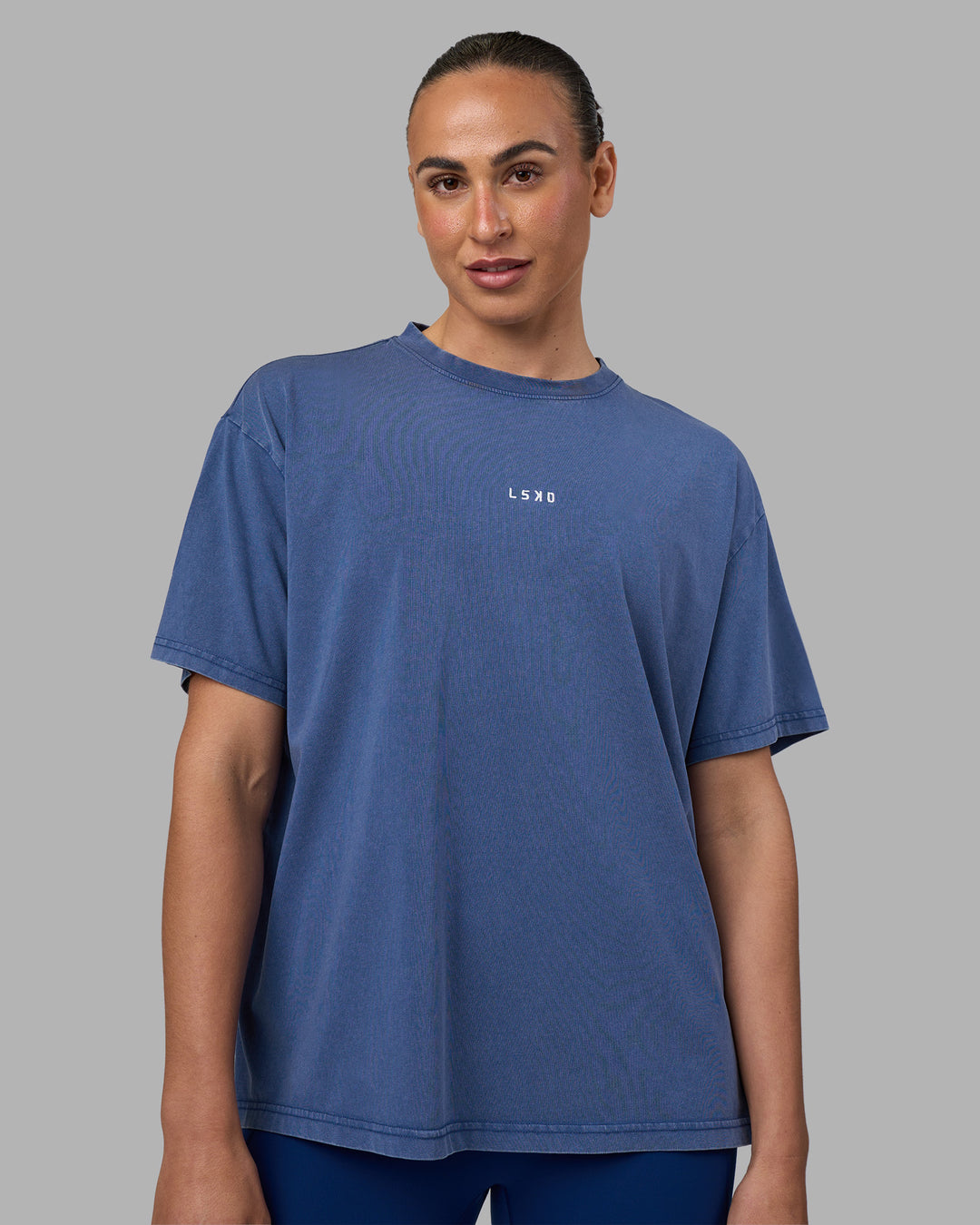 Woman wearing Go-To FLXCotton Oversized Tee - Midnight Blue Washed-White | Model:Sophie | Size:S