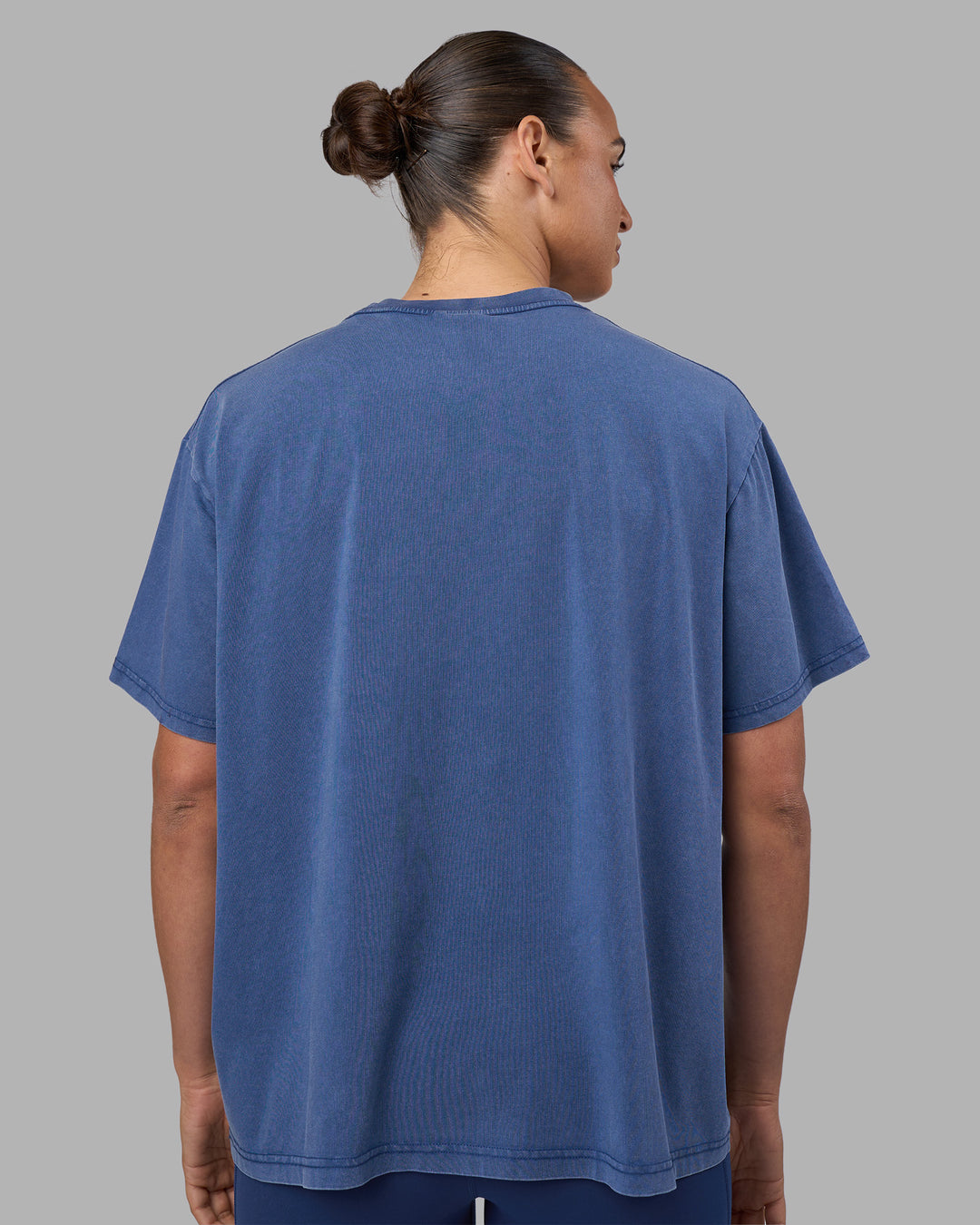 Woman wearing Go-To FLXCotton Oversized Tee - Midnight Blue Washed-White | Model:Sophie | Size:S