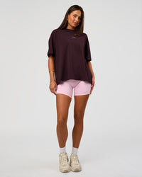 Woman wearing Go-To FLXCotton Oversized Tee - Midnight Plum-White | Model:Bianca | Size:S