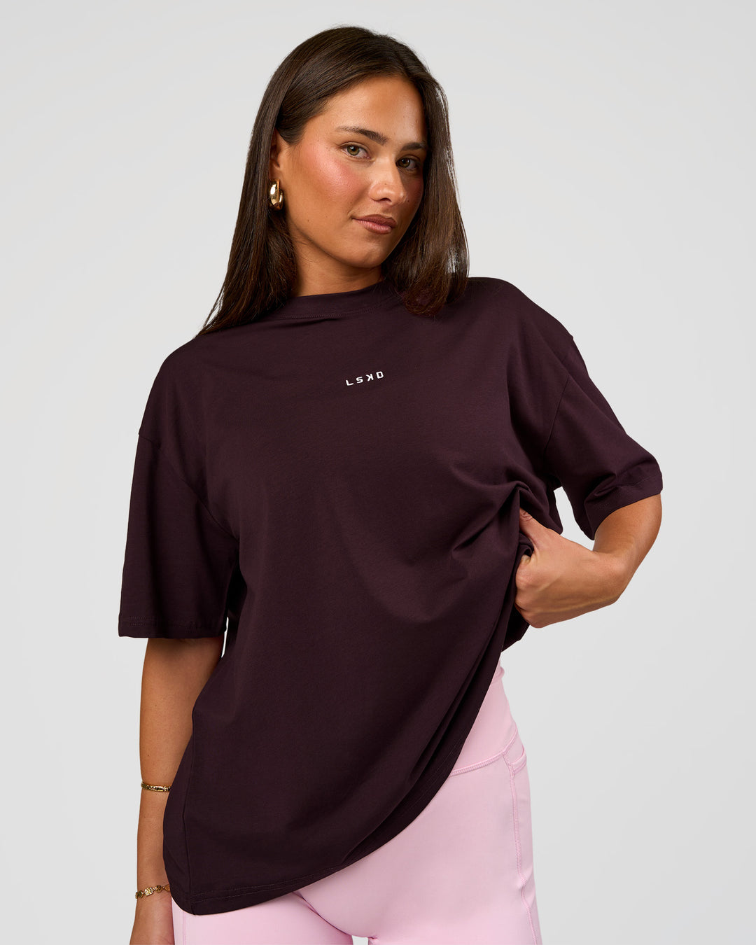 Woman wearing Go-To FLXCotton Oversized Tee - Midnight Plum-White | Model:Bianca | Size:S