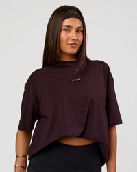 Woman wearing Go-To FLXCotton Oversized Tee - Midnight Plum-White | Model:Bianca | Size:S