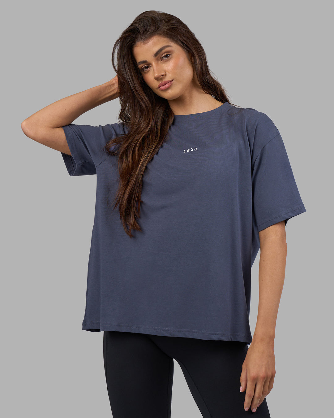 Woman wearing Go-To FLXCotton Oversized Tee - Night Shadow-White | Model:Phoebe | Size:S