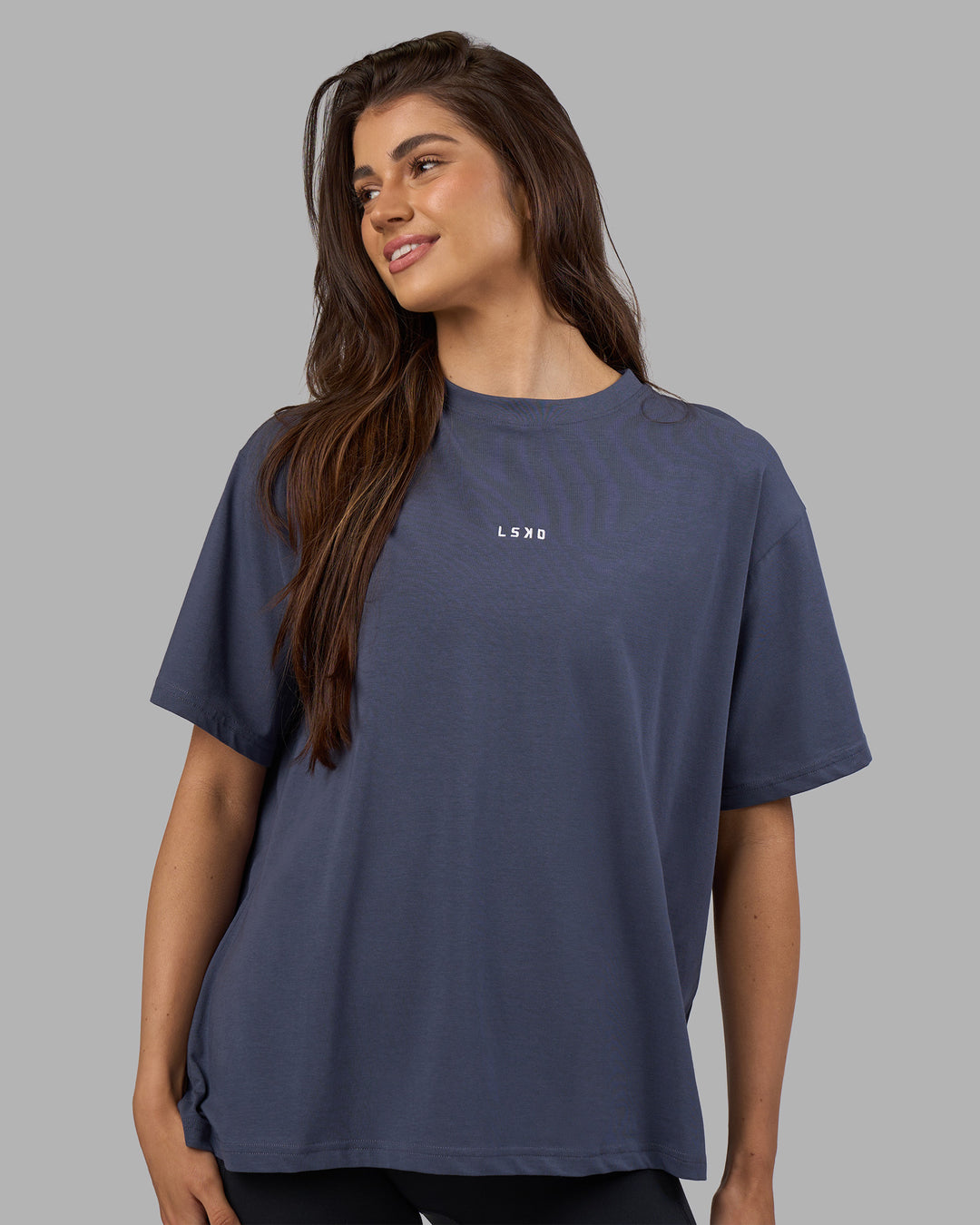 Woman wearing Go-To FLXCotton Oversized Tee - Night Shadow-White | Model:Phoebe | Size:S
