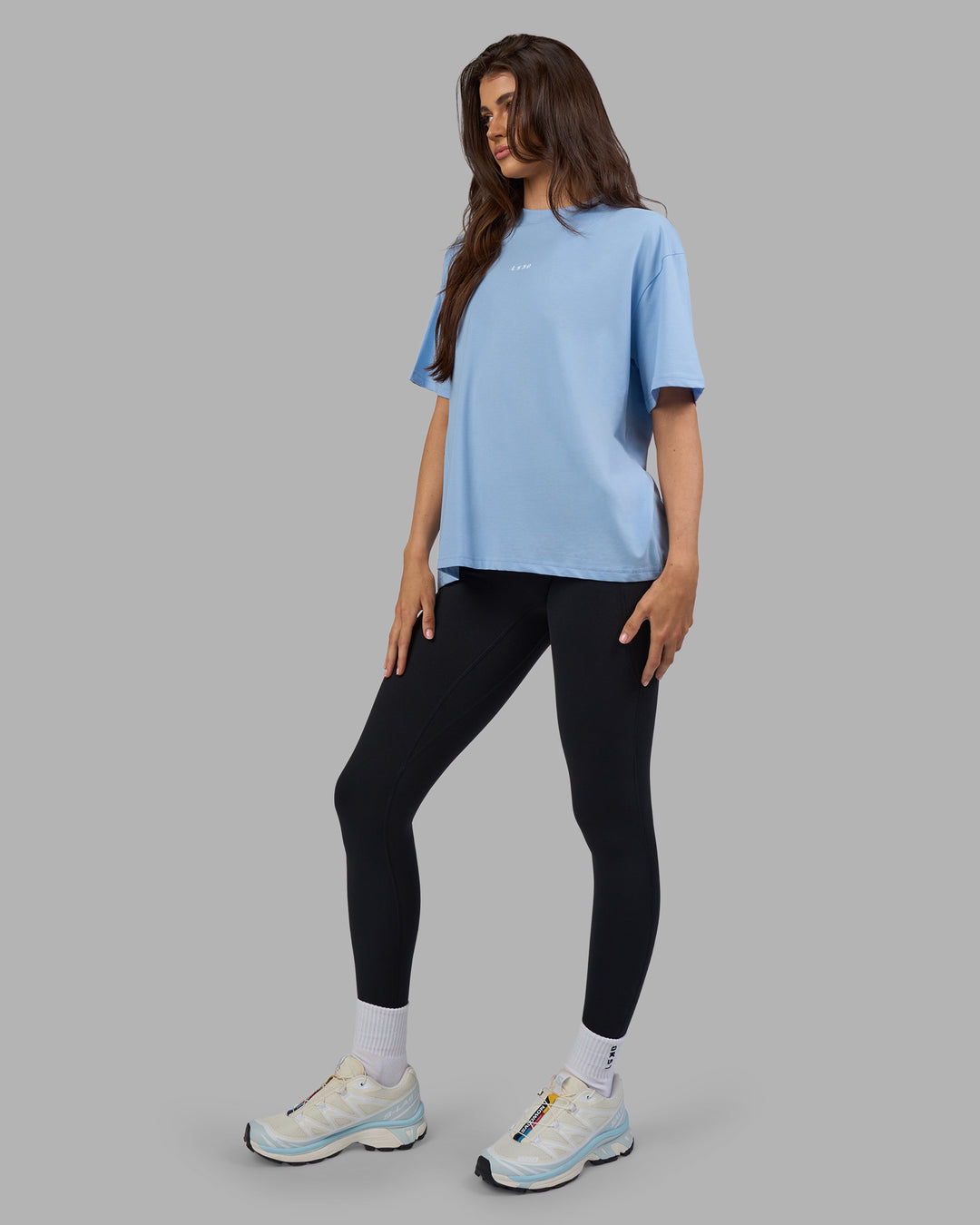 Woman wearing Go-To FLXCotton Oversized Tee - Open Air-White | Model:Phoebe | Size:S