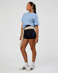 Woman wearing Go-To FLXCotton Oversized Tee - Open Air-White | Model:Rosie | Size:S