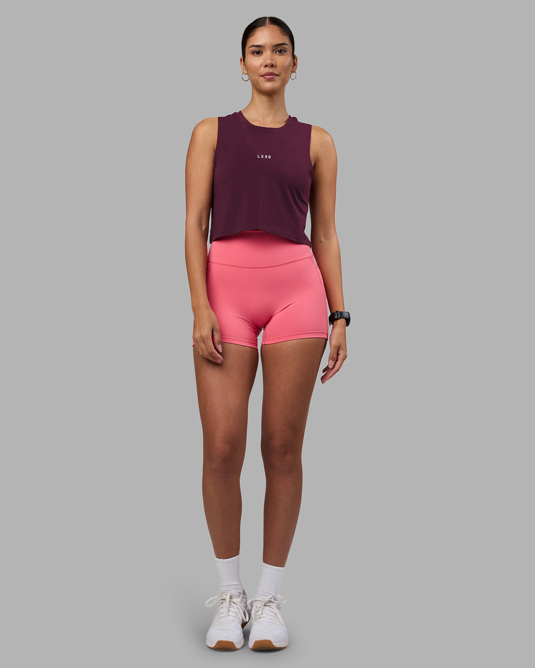 Woman wearing Go-To FLXCotton Tank - Cherry Lacquer-White | Model:Rhiley | Size:S