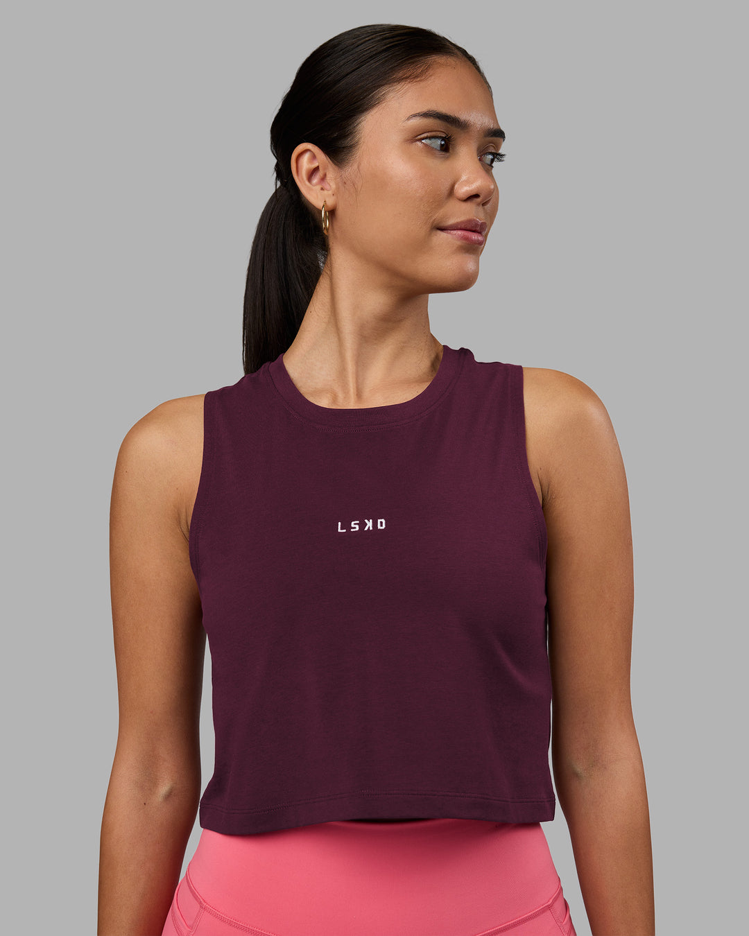 Woman wearing Go-To FLXCotton Tank - Cherry Lacquer-White | Model:Rhiley | Size:S