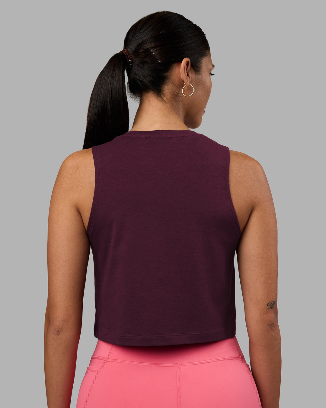 Woman wearing Go-To FLXCotton Tank - Cherry Lacquer-White | Model:Rhiley | Size:S