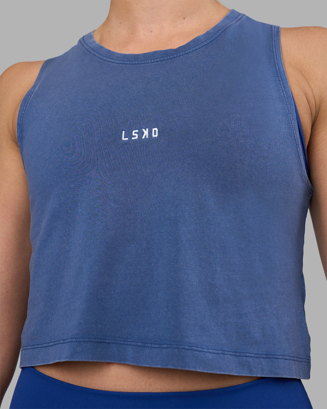 Woman wearing Go-To FLXCotton Tank - Midnight Blue Washed-White | Model:Sophie | Size:S