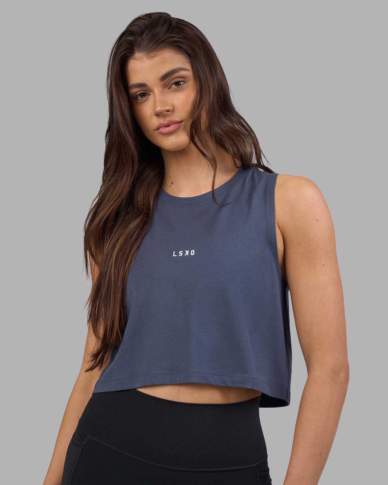 Woman wearing Go-To FLXCotton Tank - Night Shadow-White | Model:Phoebe | Size:S