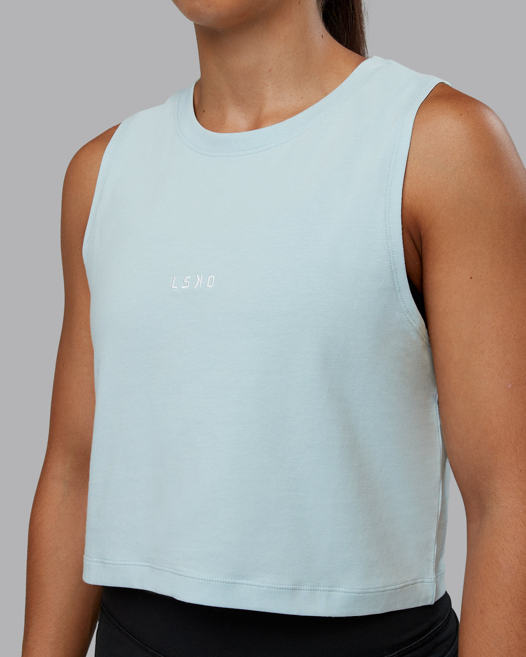 Woman wearing Go-To FLXCotton Tank in Skyride-White | Size:S | Model:Tylah
