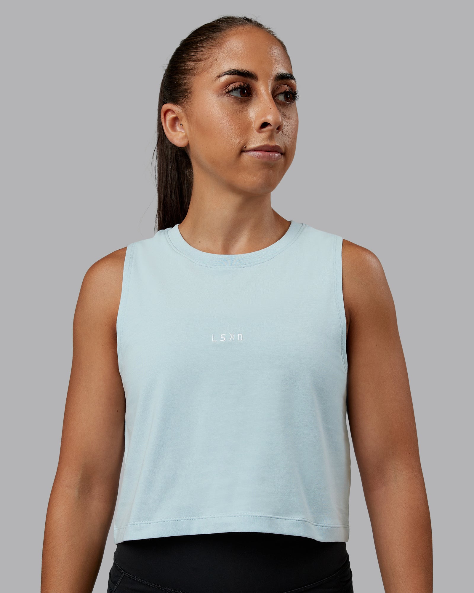 Woman wearing Go-To FLXCotton Tank in Skyride-White | Size:S | Model:Tylah