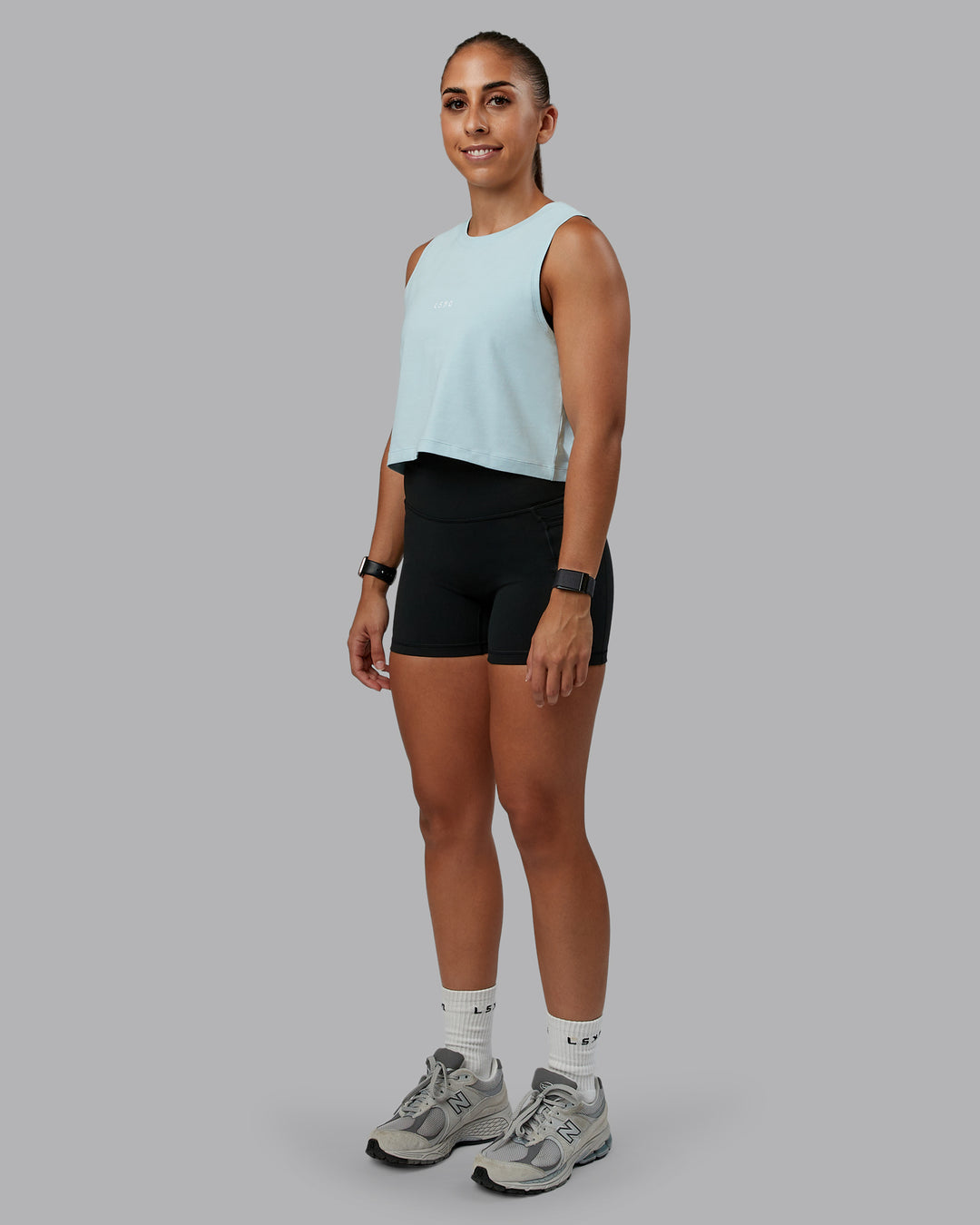 Woman wearing Go-To FLXCotton Tank in Skyride-White | Size:S | Model:Tylah