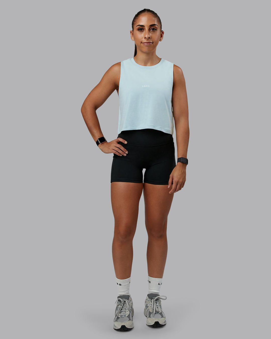 Woman wearing Go-To FLXCotton Tank in Skyride-White | Size:S | Model:Tylah
