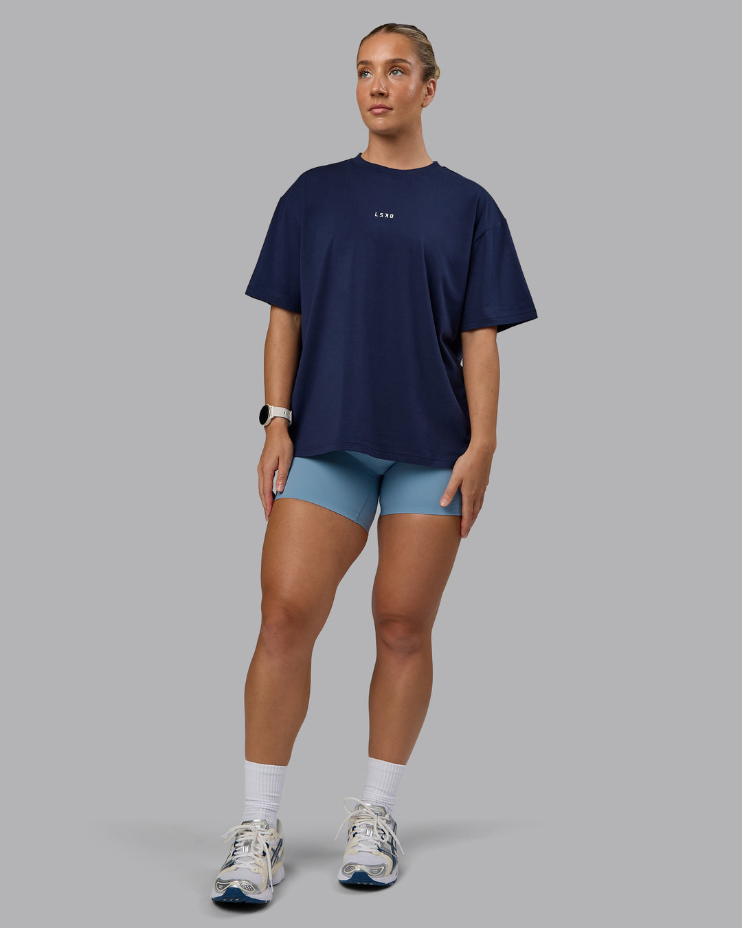 Woman wearing Go-To FLXCotton Oversized Tee - Future Navy-White | Model:Lyss | Size:S