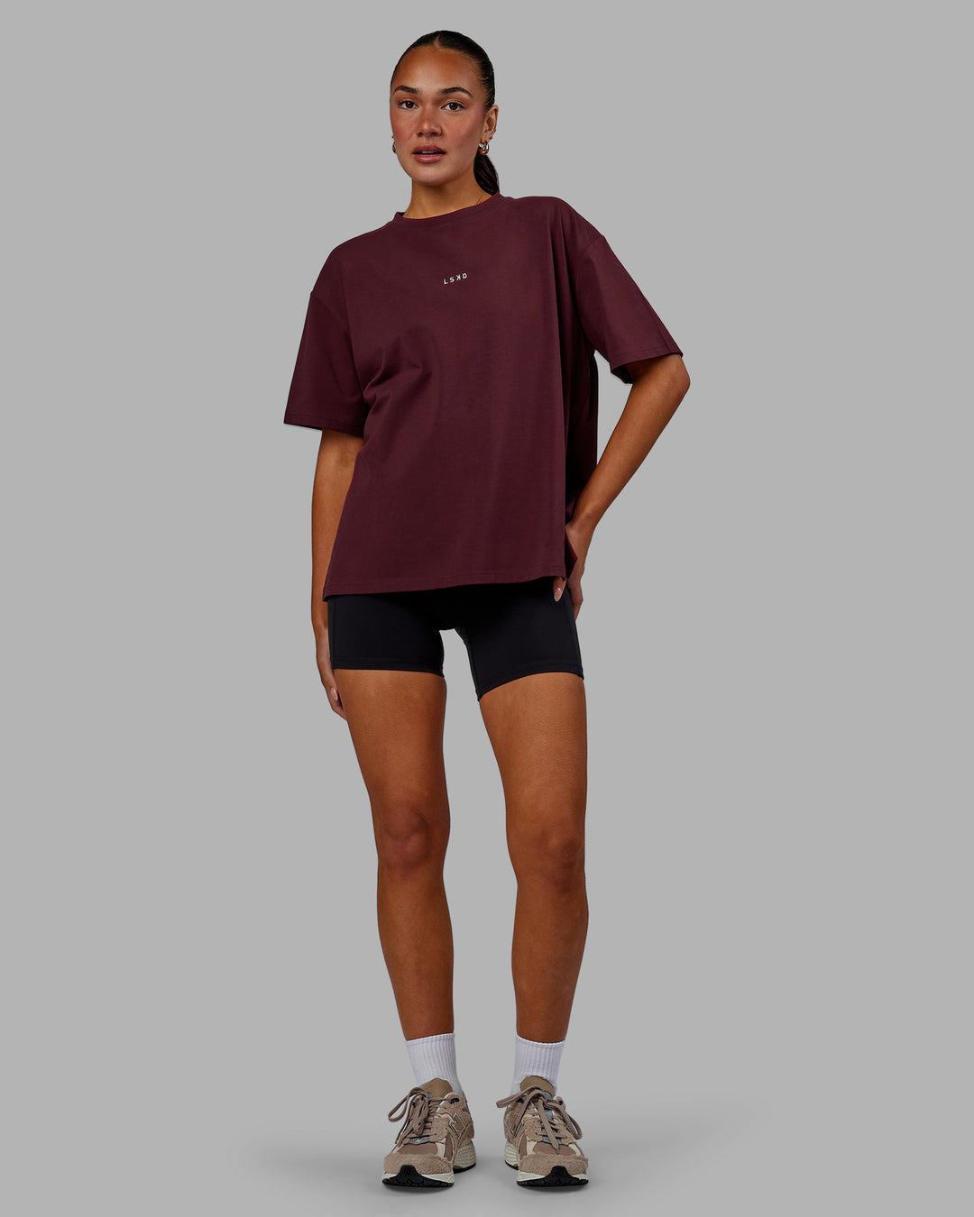 Woman wearing Go-To FLXCotton Oversized Tee - Cherry Lacquer-White | Model:Kirstyn | Size:S