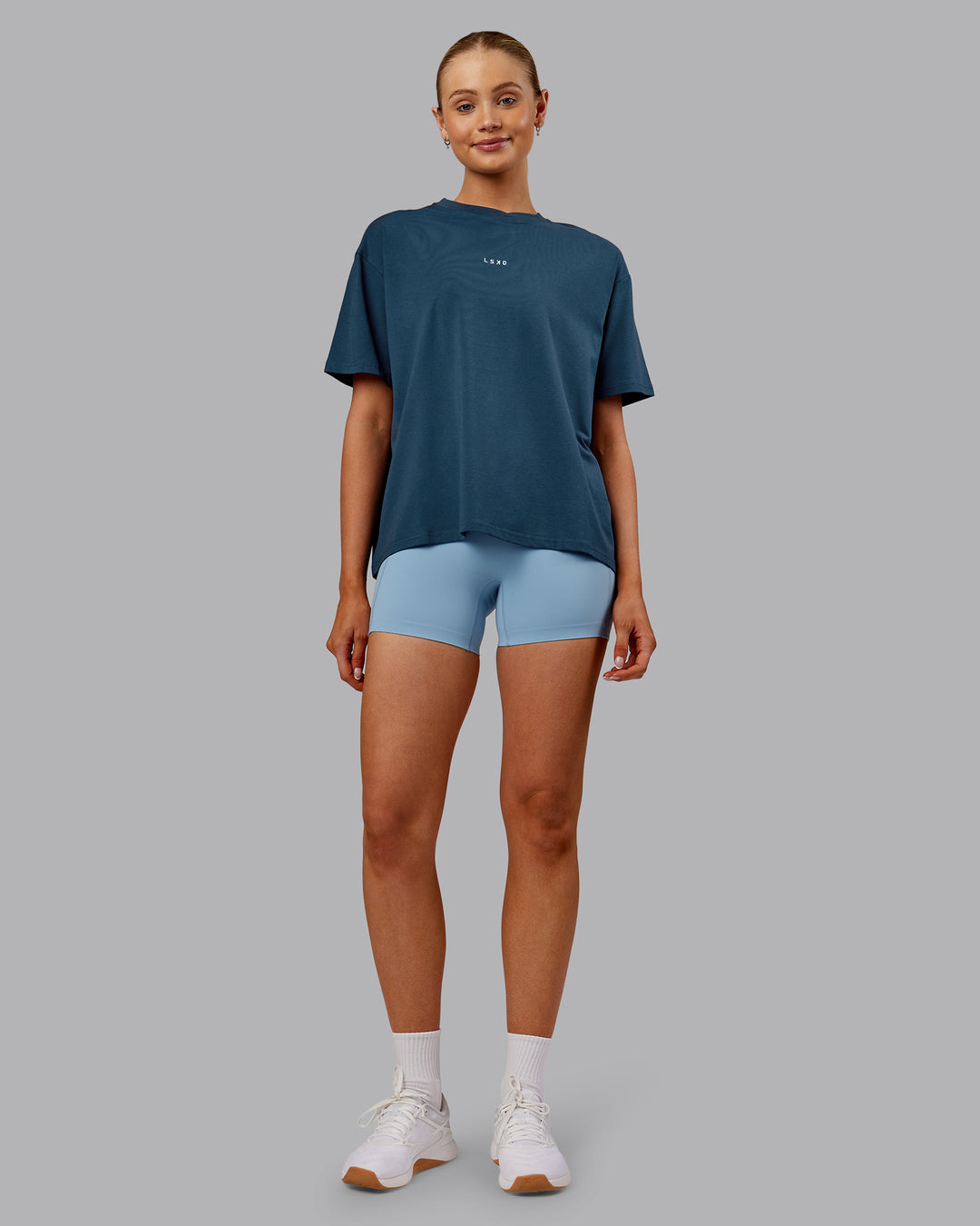 Woman wearing Go-To FLXCotton Oversized Tee - Indigo-White | Model:Ella | Size:S