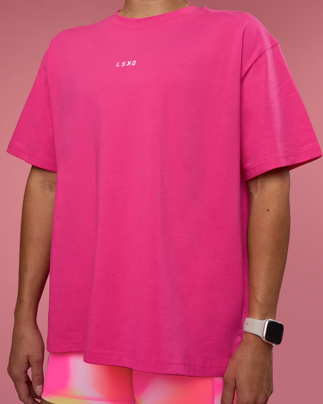 Woman wearing Go-To FLXCotton Oversized Tee - Ultra Pink-White | Model:Hannah | Size:S