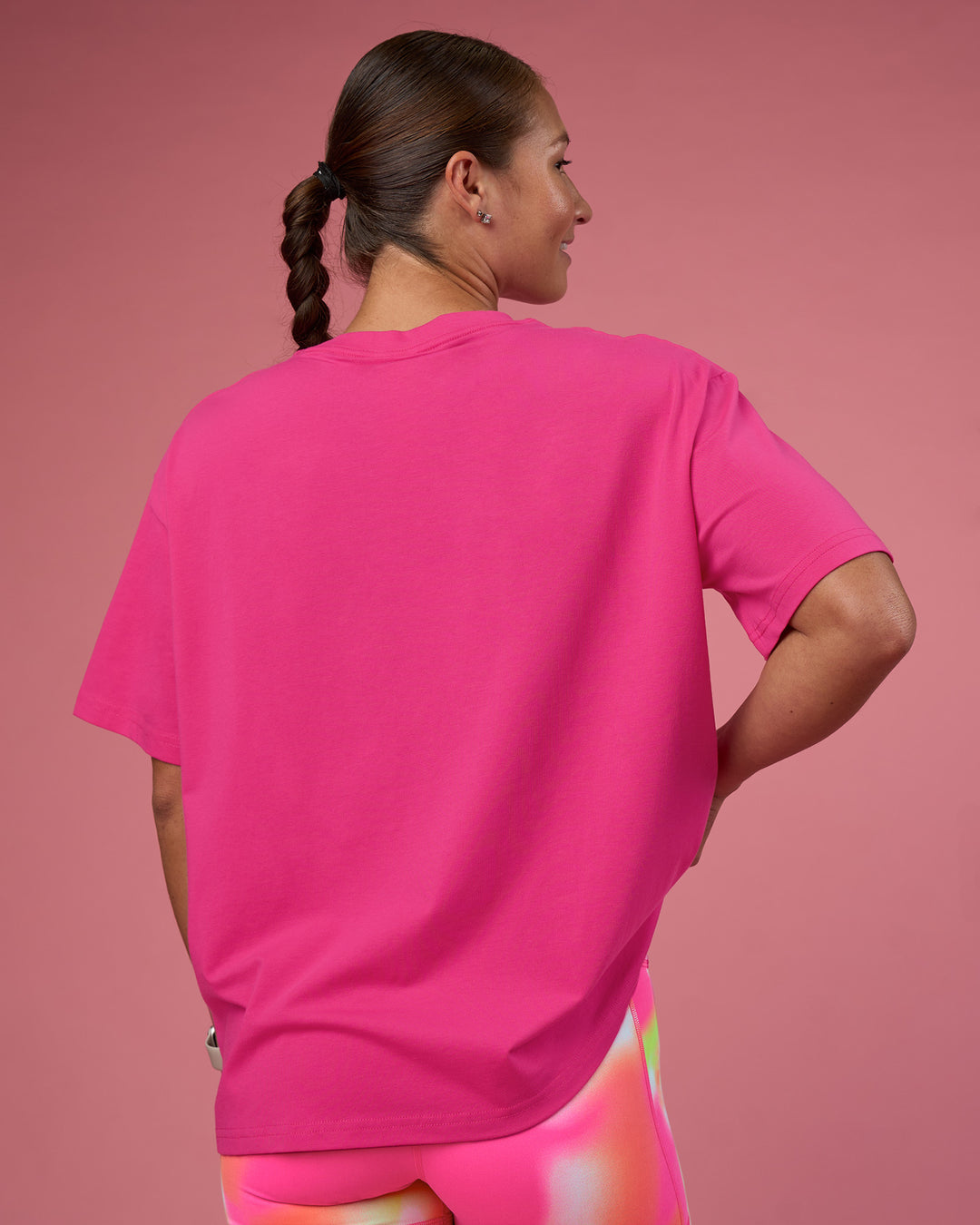 Woman wearing Go-To FLXCotton Oversized Tee - Ultra Pink-White | Model:Hannah | Size:S