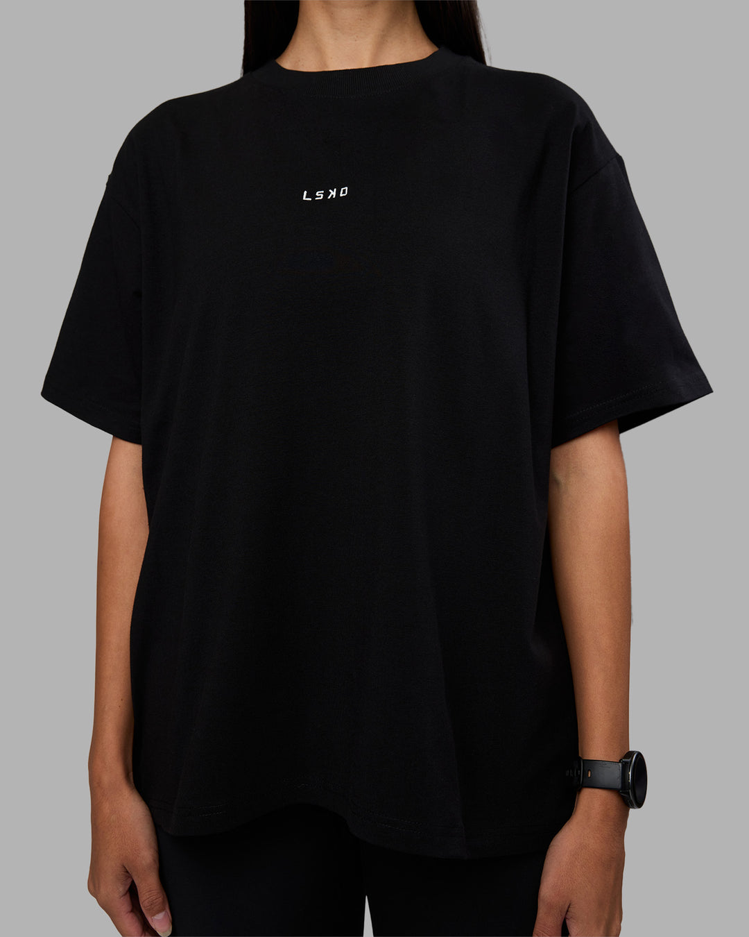 Woman wearing Go-To Heavyweight Oversized Tee - Black | Model:Rhiley | Size:S