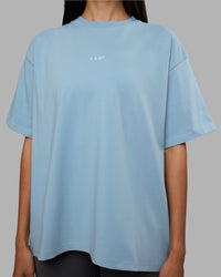 Woman wearing Go-To Heavyweight Oversized Tee - Glacier Lake | Model:Rhiley | Size:S