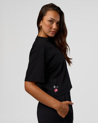 Woman wearing Go-To Heavyweight Reflective Skimmer Tee - Black-Reflective | Model:Kirstyn | Size:S
