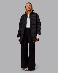 Woman wearing Go-To Puffer Long Jacket - Black | Model:Ella | Size:S